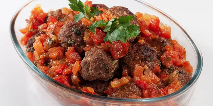 Soutzoukakia Smyrneika: Greek Meatballs in Tomato-Cumin Sauce
